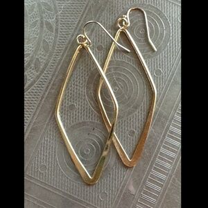 Gold-colored big diamond-shaped hoops